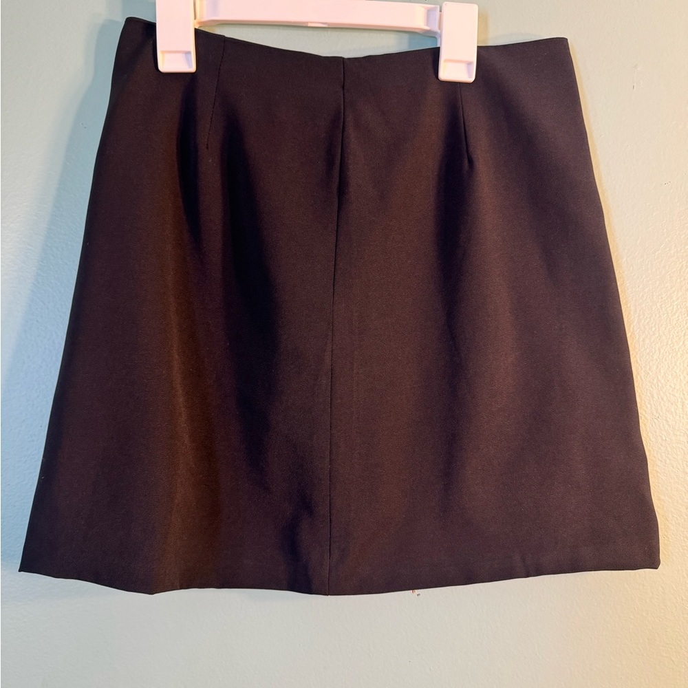 Amaryllis , black skirt, size medium.